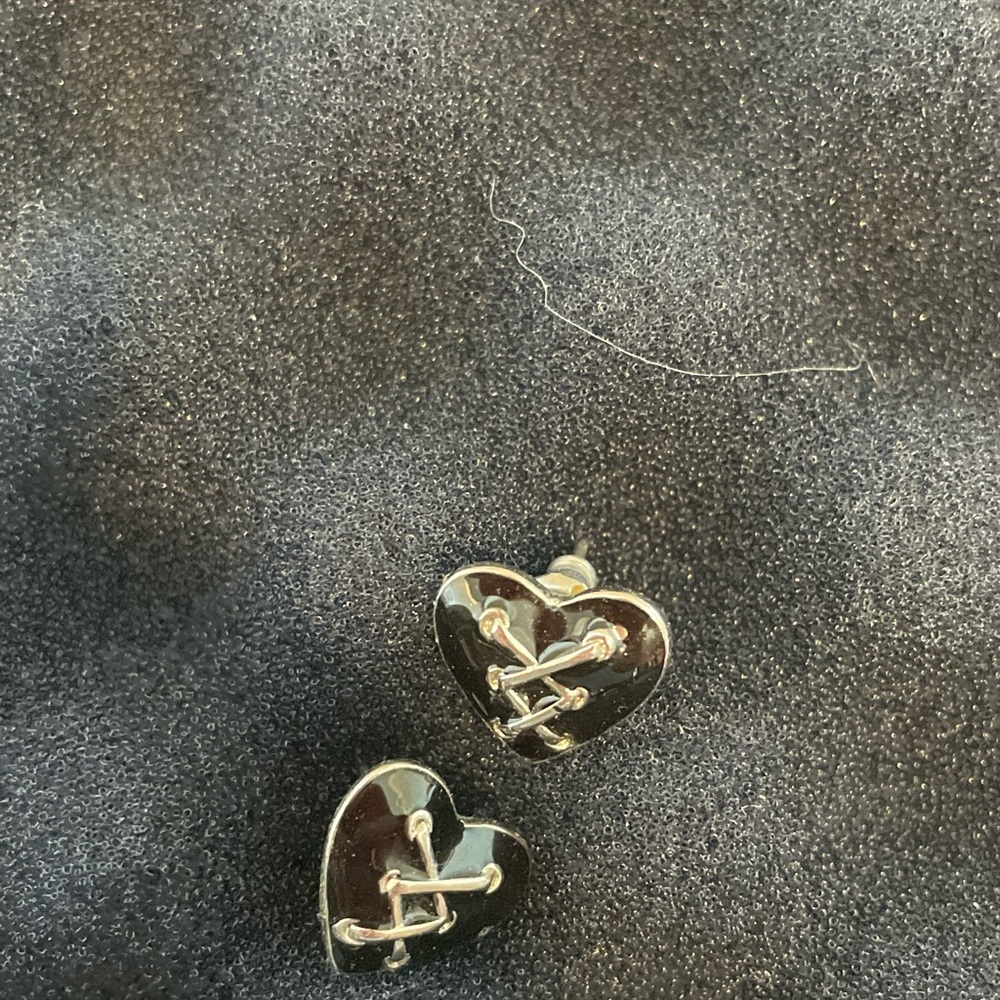 Black enamel corset tied heart earrings